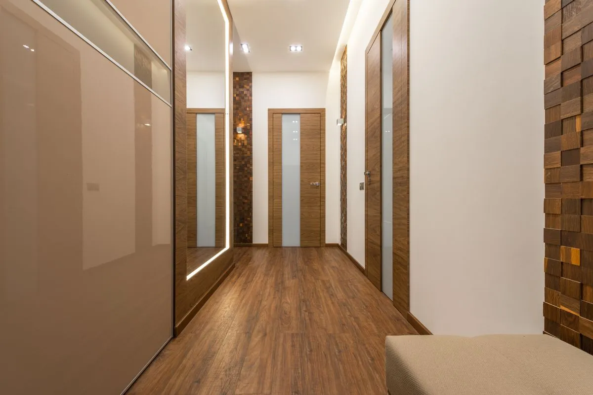 Hallway finished with warm timber flooring